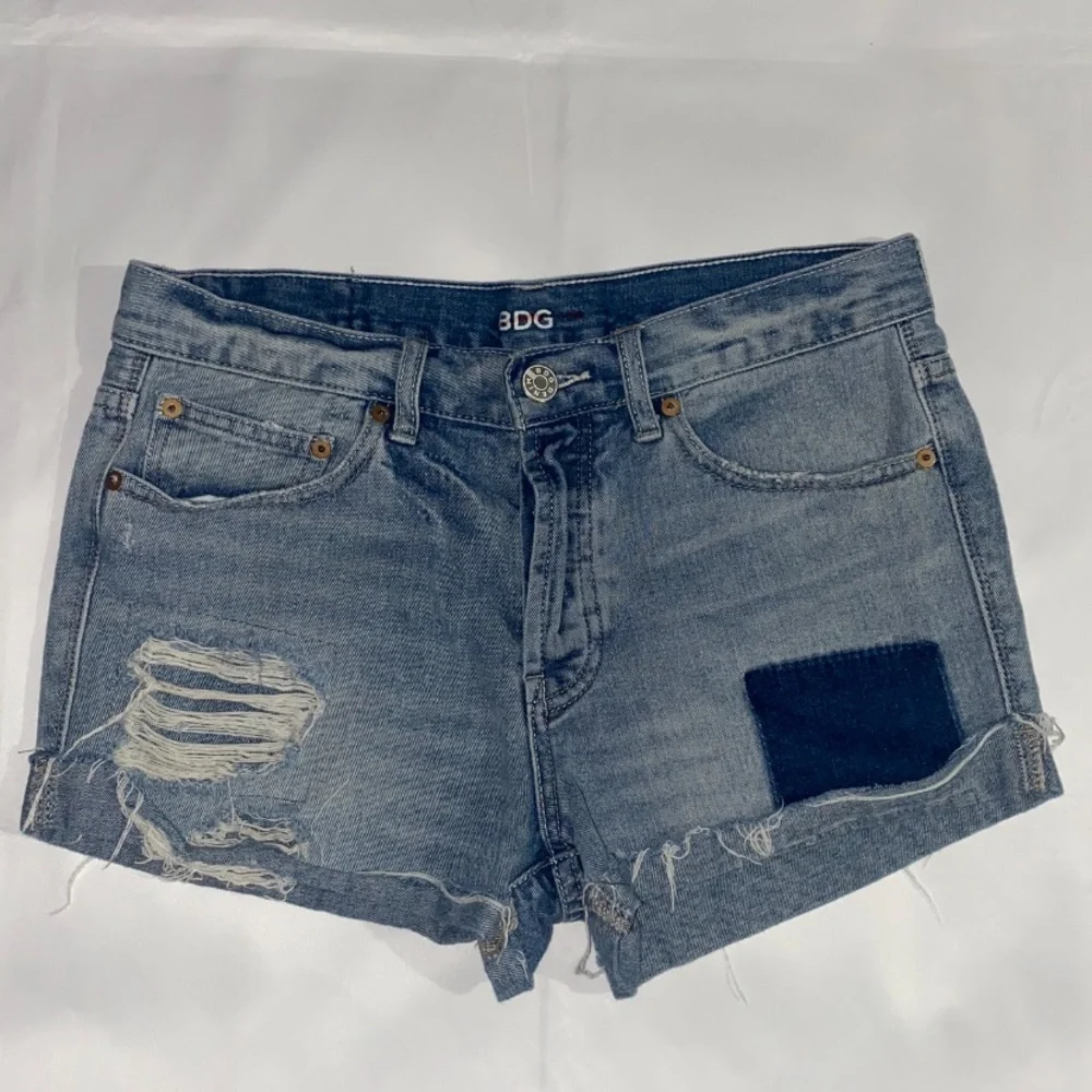 BDG High Rise Button Fly Distressed & Patched Tomgirl Jean Shorts
